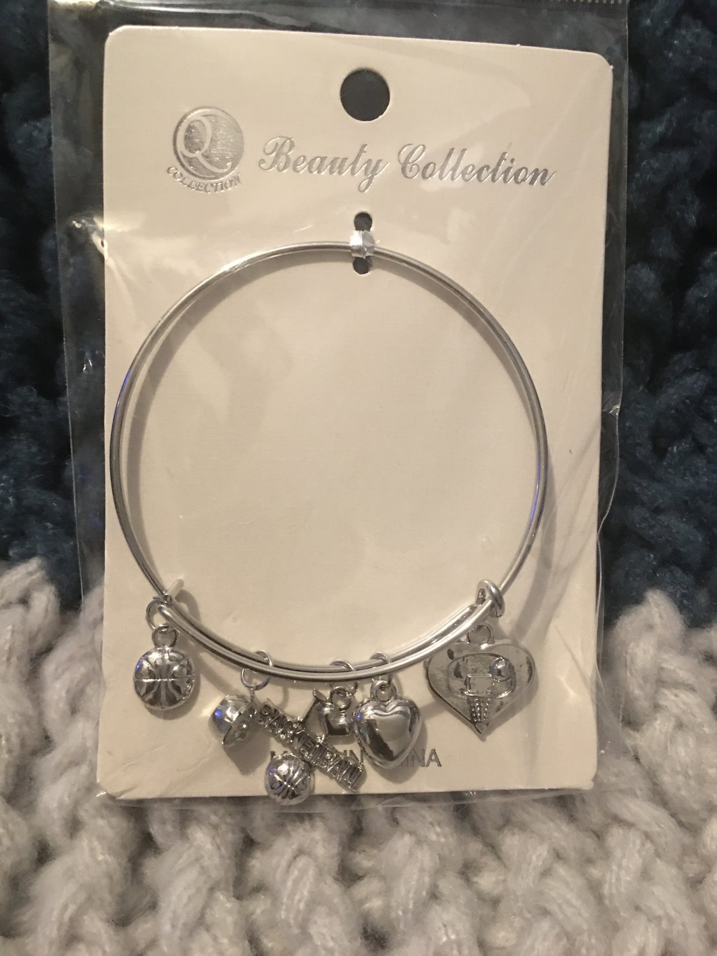 Brazalete de baloncesto de plata
