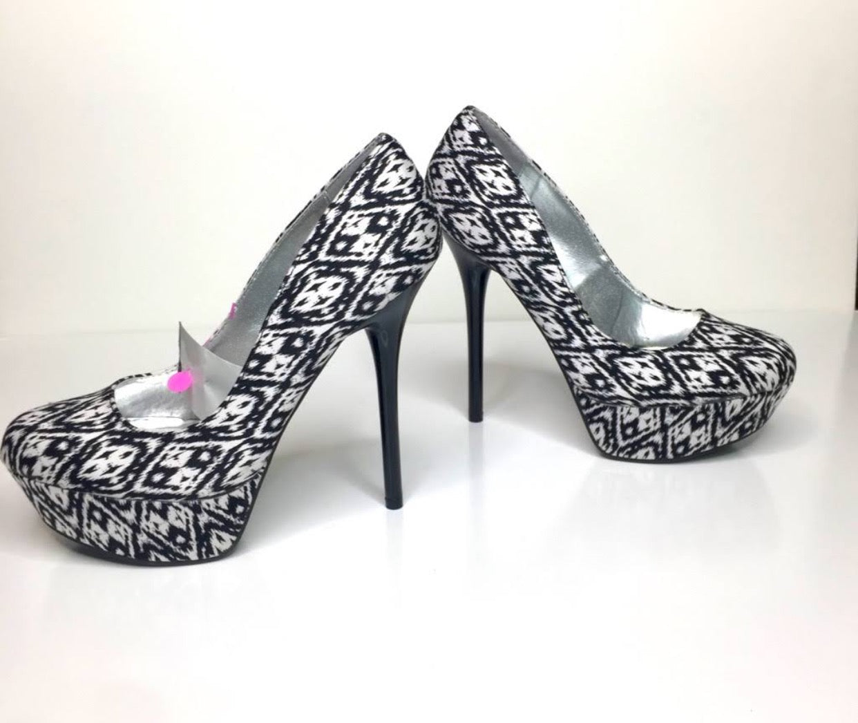 Black and white Qupid heels